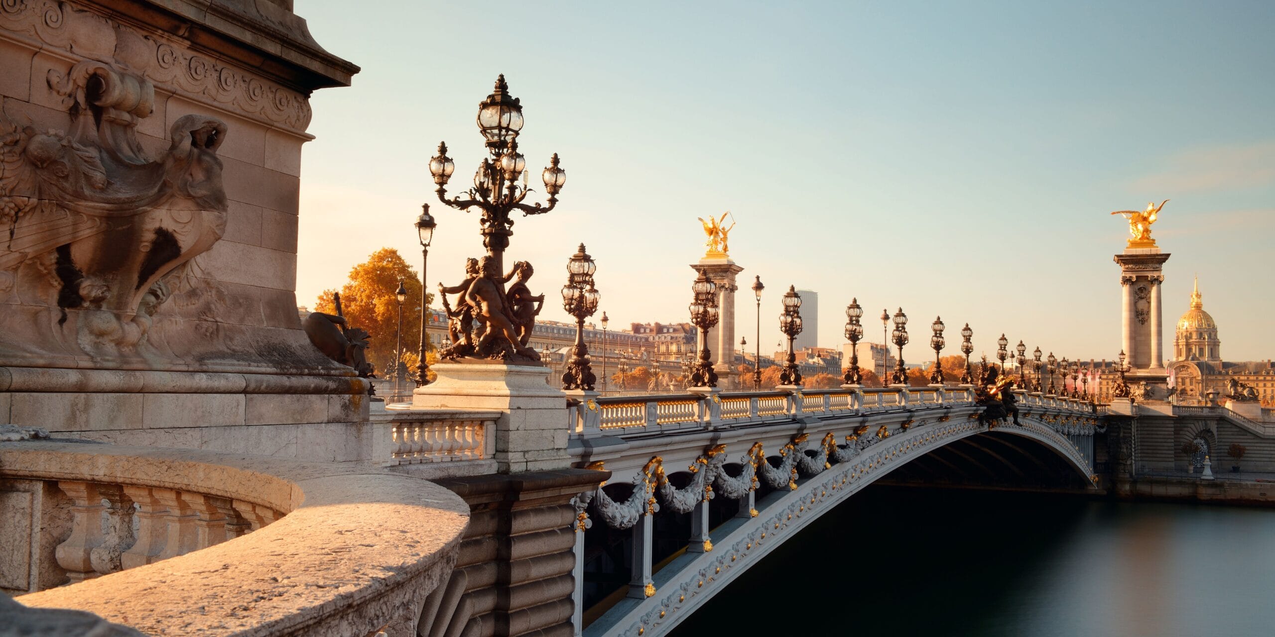 Peaceful French bridge surrounded by water Scenic bridge in France surrounded by water